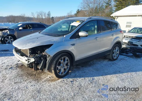 2014 Ford Escape Titanium z USA, uszkodzony, nr VIN 1FMCU0JX9EUB65991